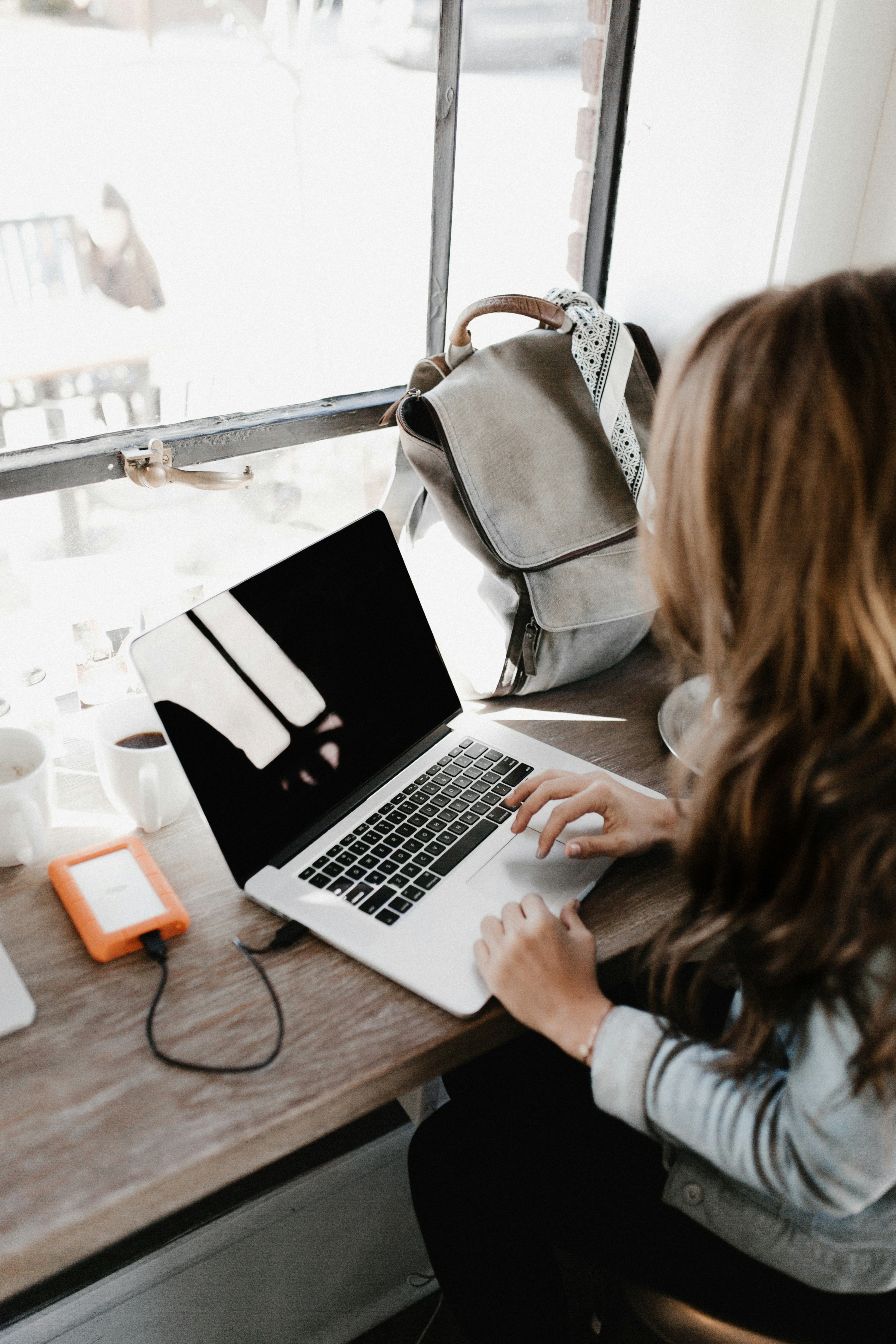 a woman with a laptop